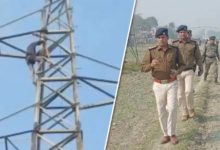 mental youth climb on a high tension electric tower for a mobile
